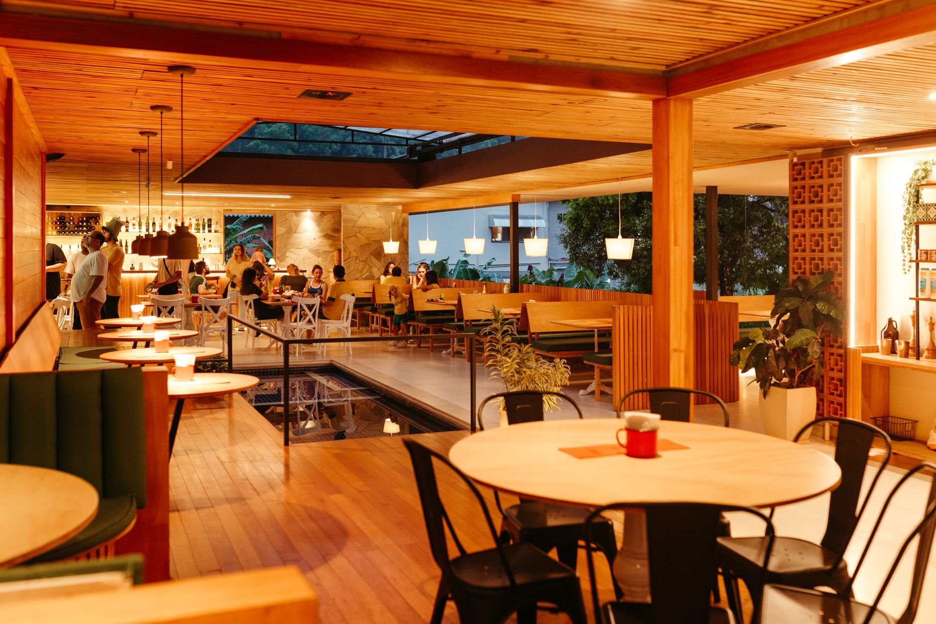 Warm and inviting restaurant interior with ambient wooden decor